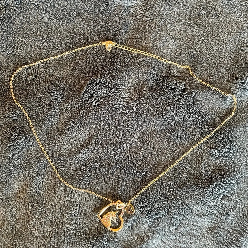 Gold unicorn heart and letter “A” necklace